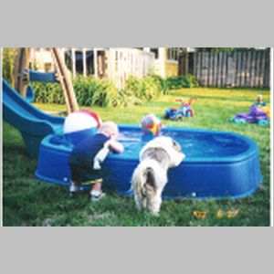 Lady and Danny by pool.jpg